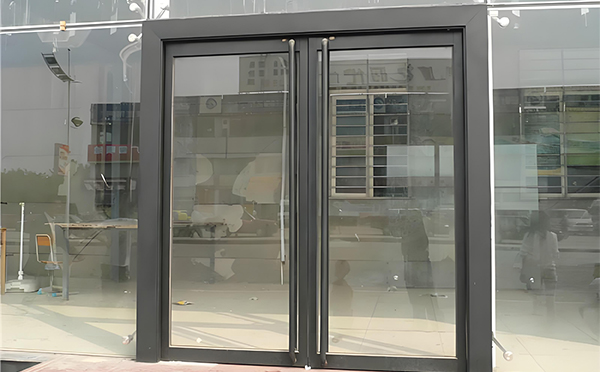 甘谷玻璃地弹门